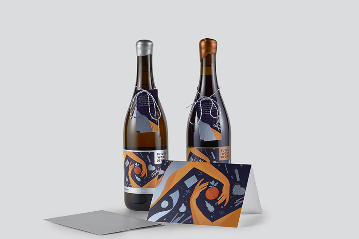Photograph of 2 wine bottles with gift tags, colorful, illustrated labels, matching card. Label reads “Future Work Design.”